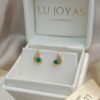 Topos en oro 18k con esmeralda ovalada